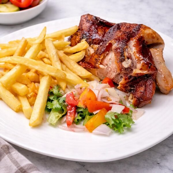 Medio pollo con patatas fritas